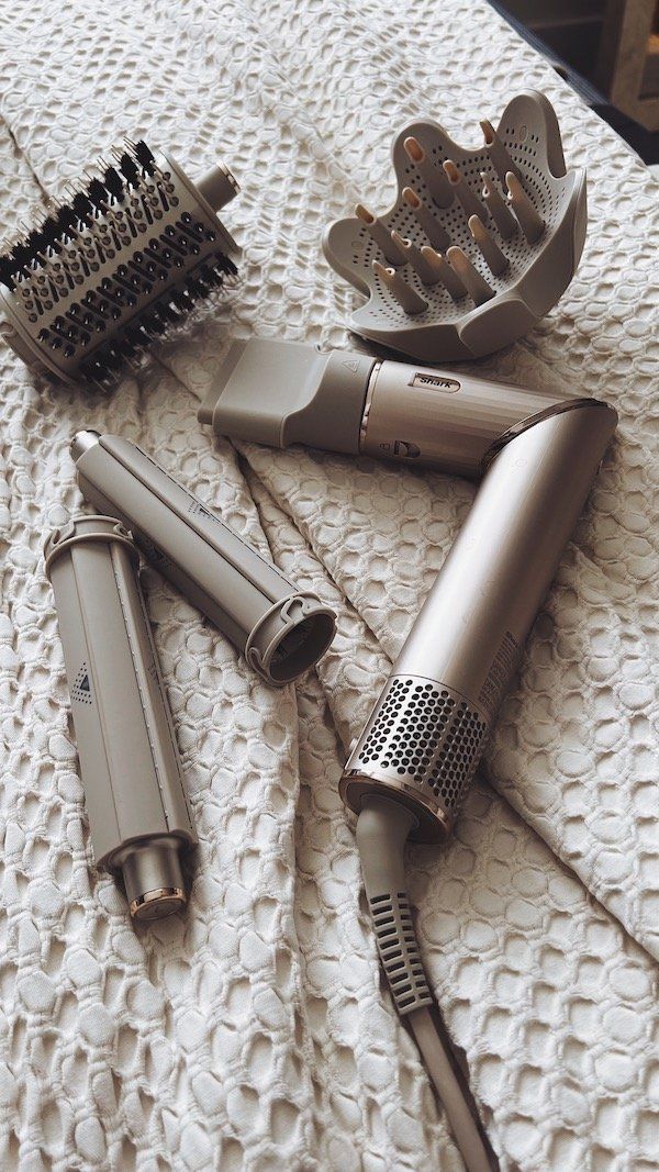 Multi-styler hair tool with brush and diffuser attachments